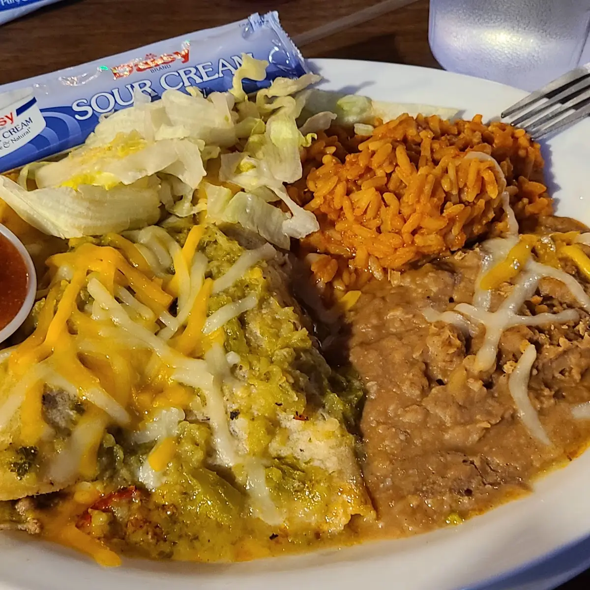 Beef Enchiladas with Green Chili Refried Beans and Rice