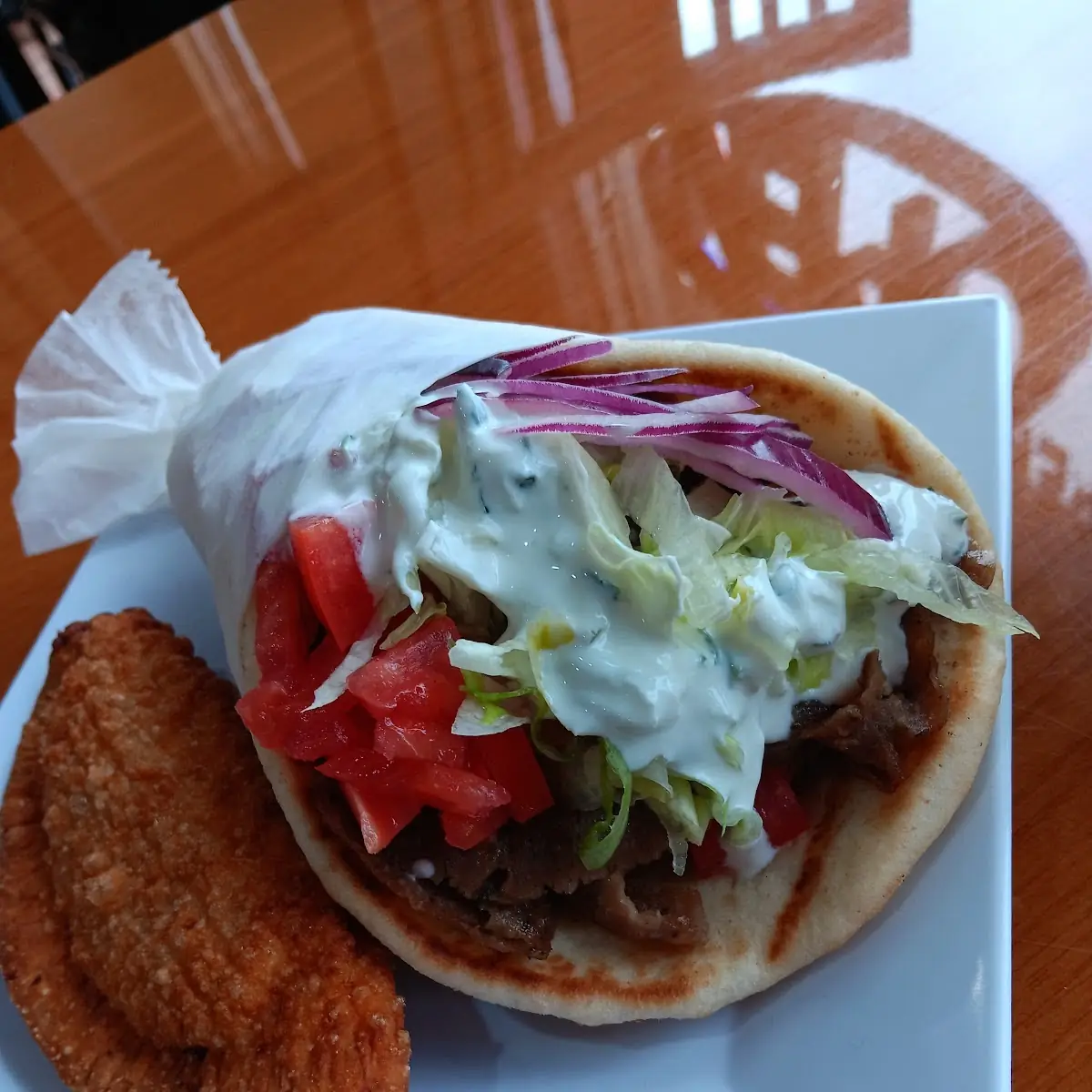 Lamb Gyro & Buffalo Chicken Empanada