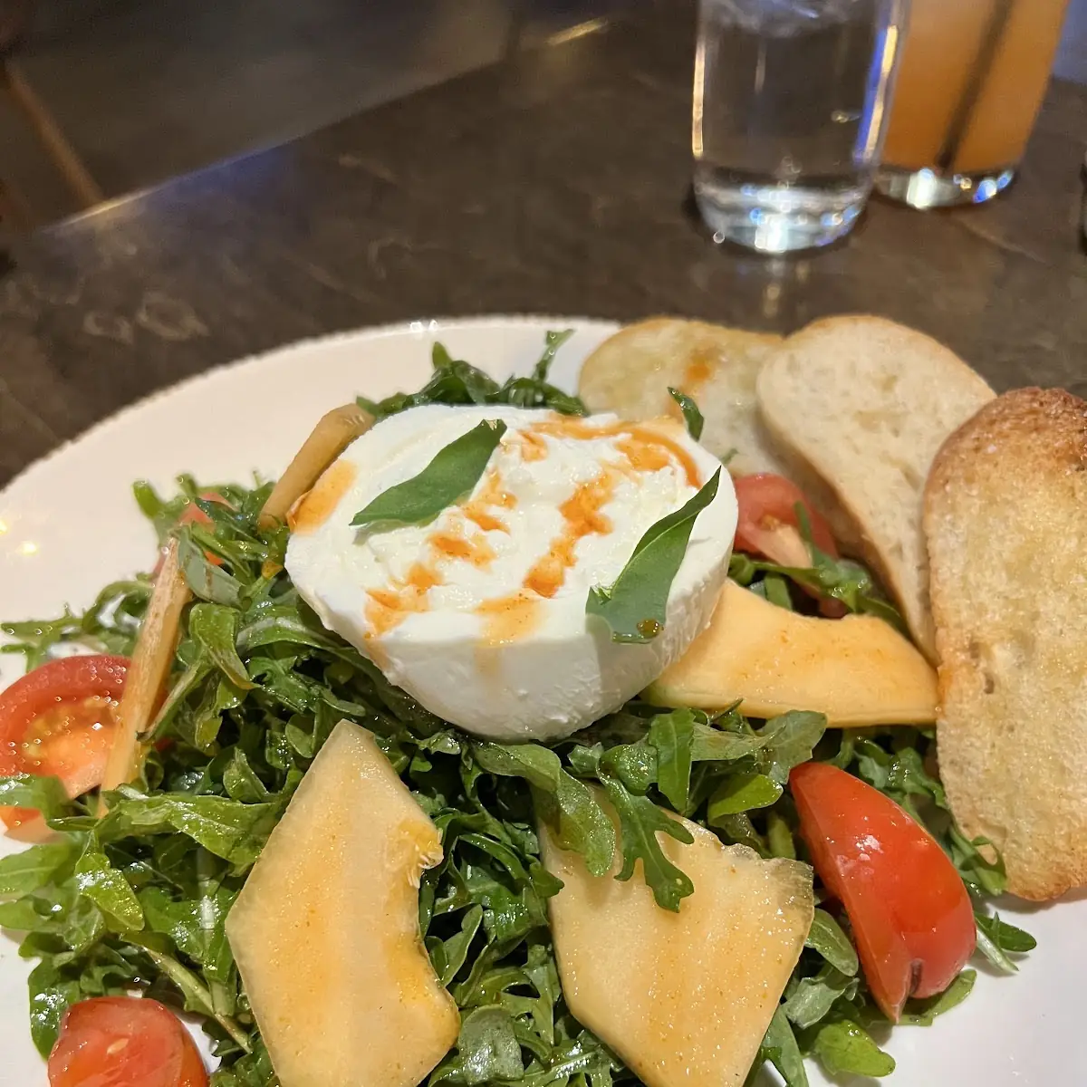 Truffle Spiked Burrata & Heirloom Tomatoes