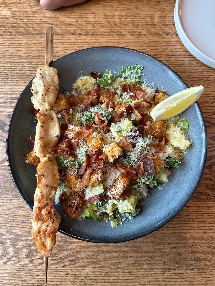 Bacon Caesar Salad with Chicken Skewer