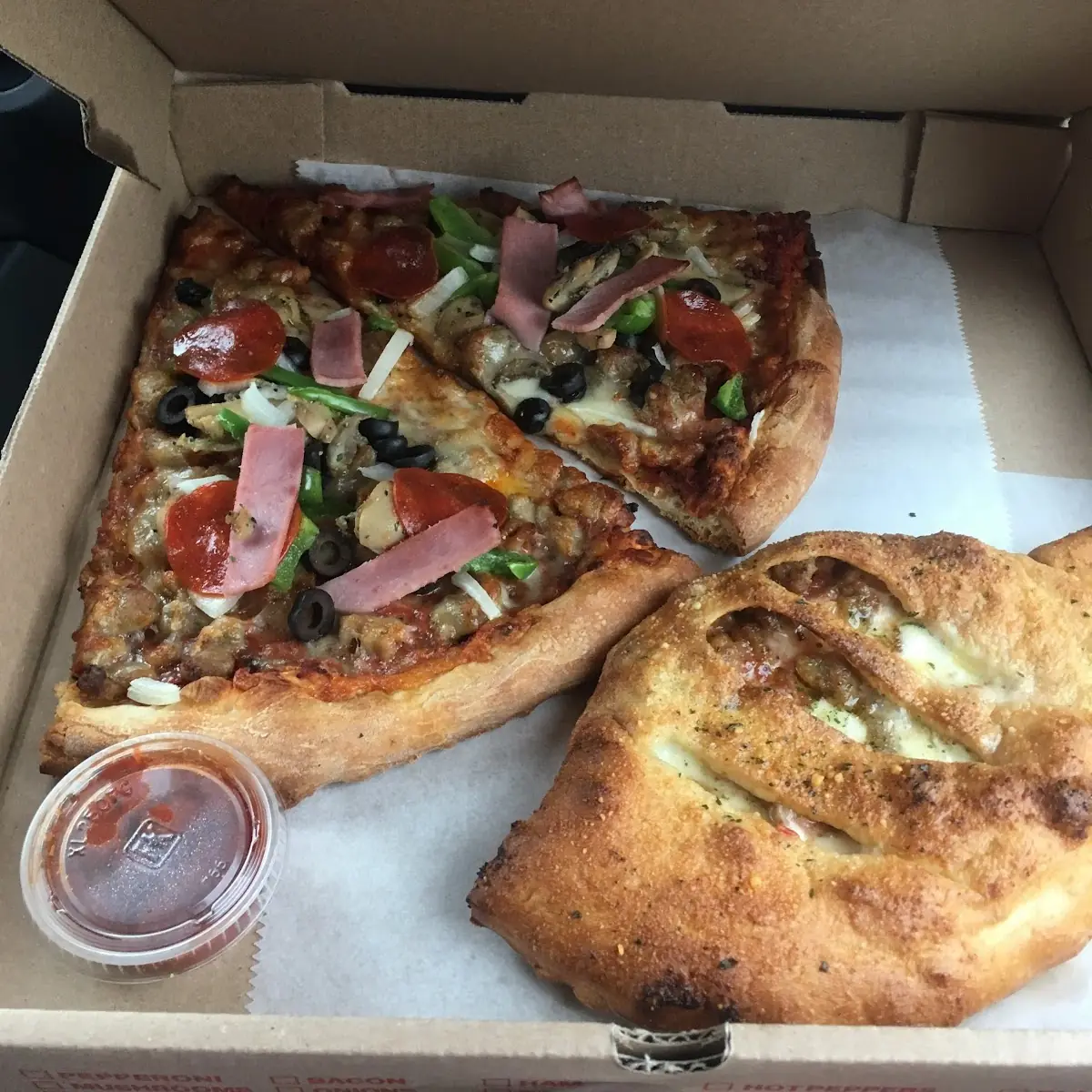 Meat Lovers Pizza and Spinach Calzone
