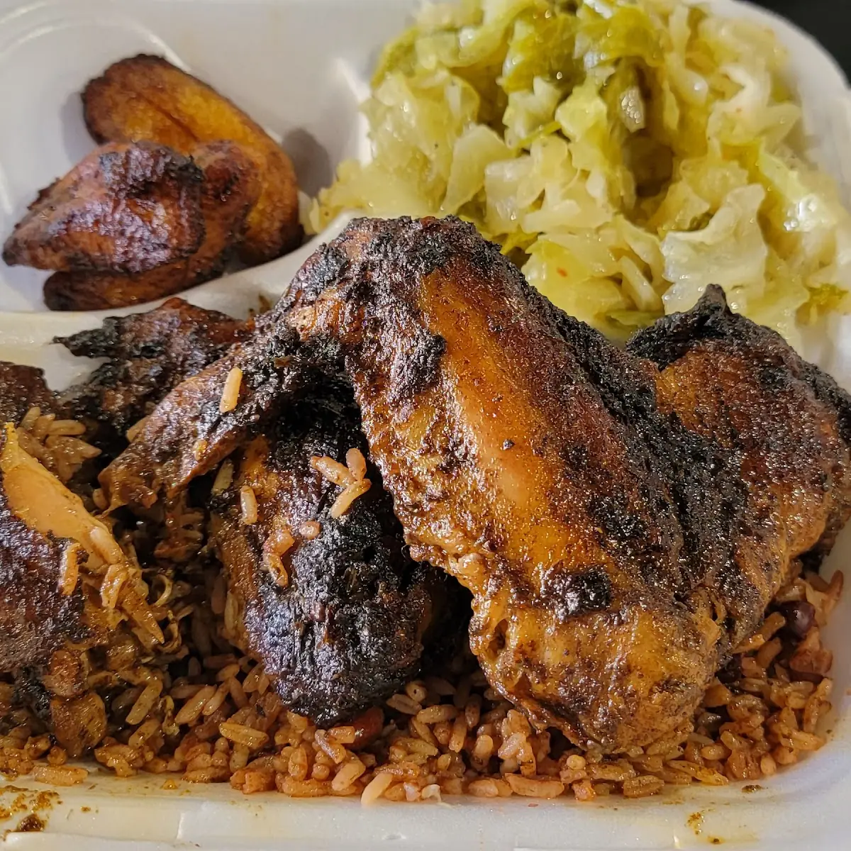Jerk Chicken Includes Rice & Peas or White Rice