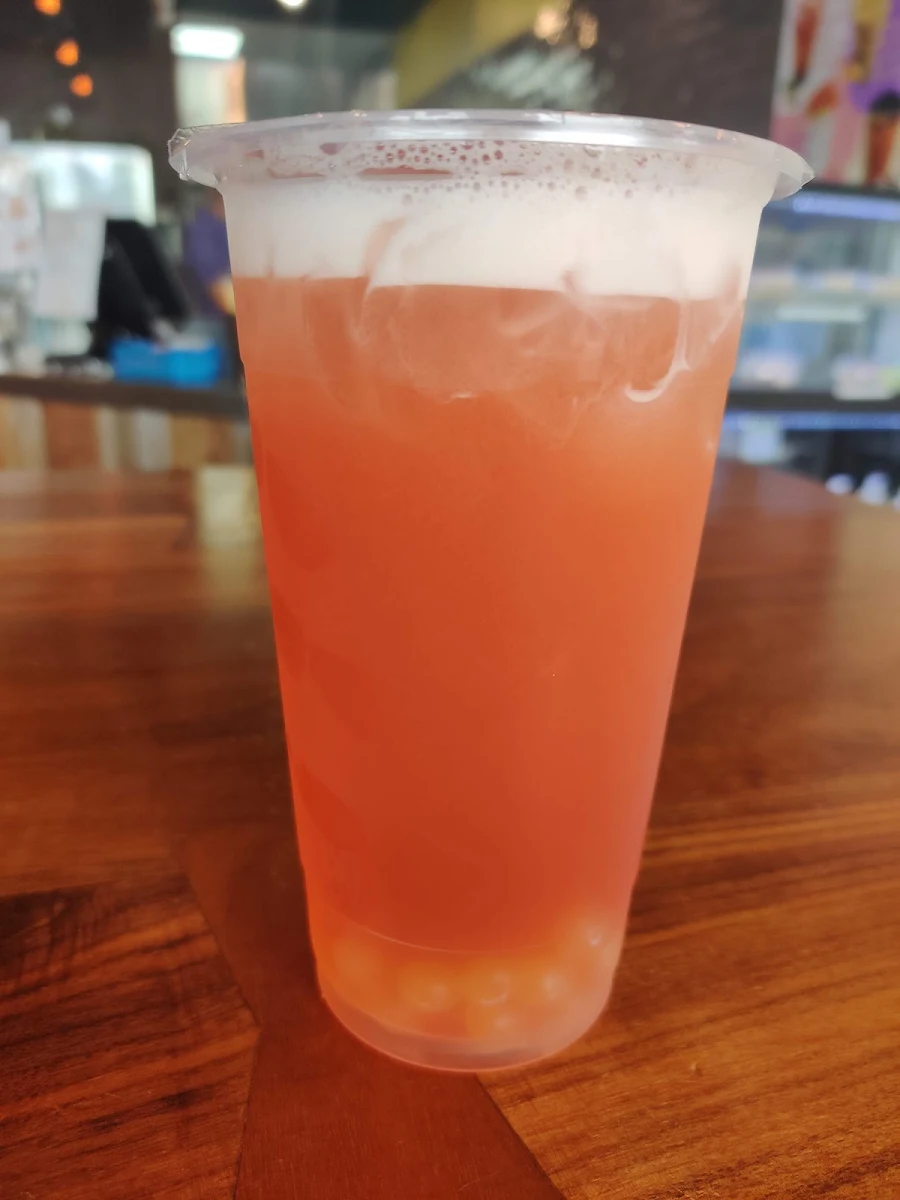 Pomegranate Lychee Tea with Peach Popping Bubbles