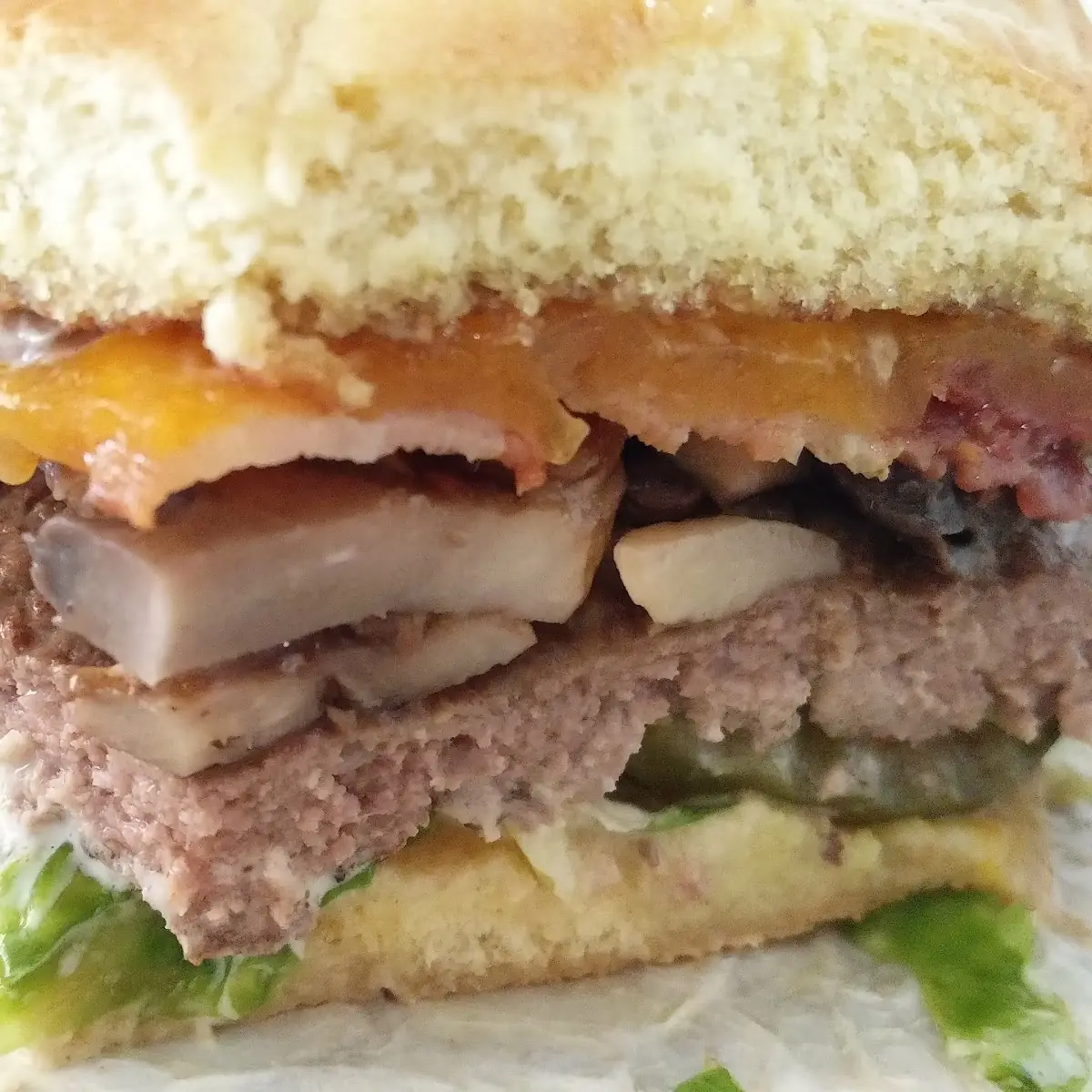 Mushroom Swiss Burger with Cheddar Cheese