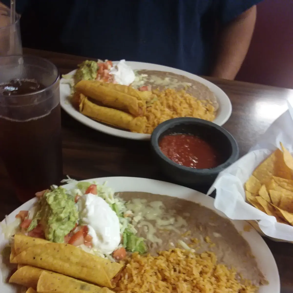 Taquitos Mexicanos with Beans Rice and Salad
