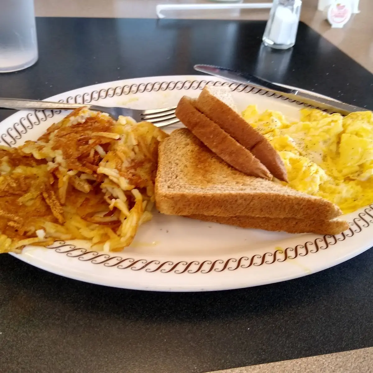 2 Eggs Bacon Hash Browns and Toast