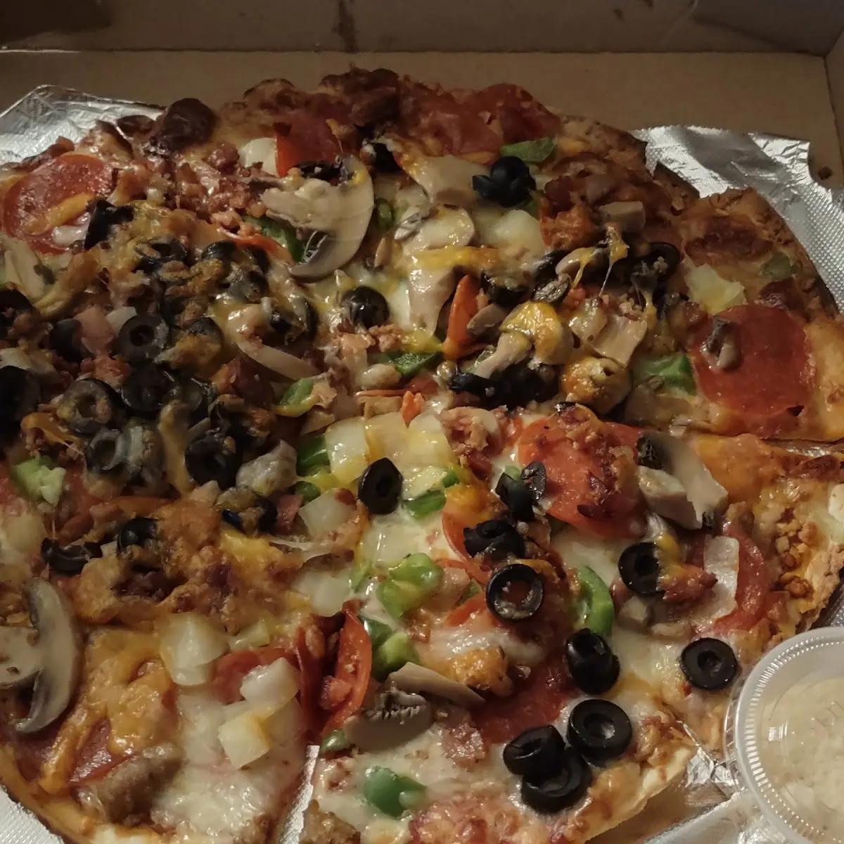 Supreme Pizza with All the Toppings Minus Jalapenos