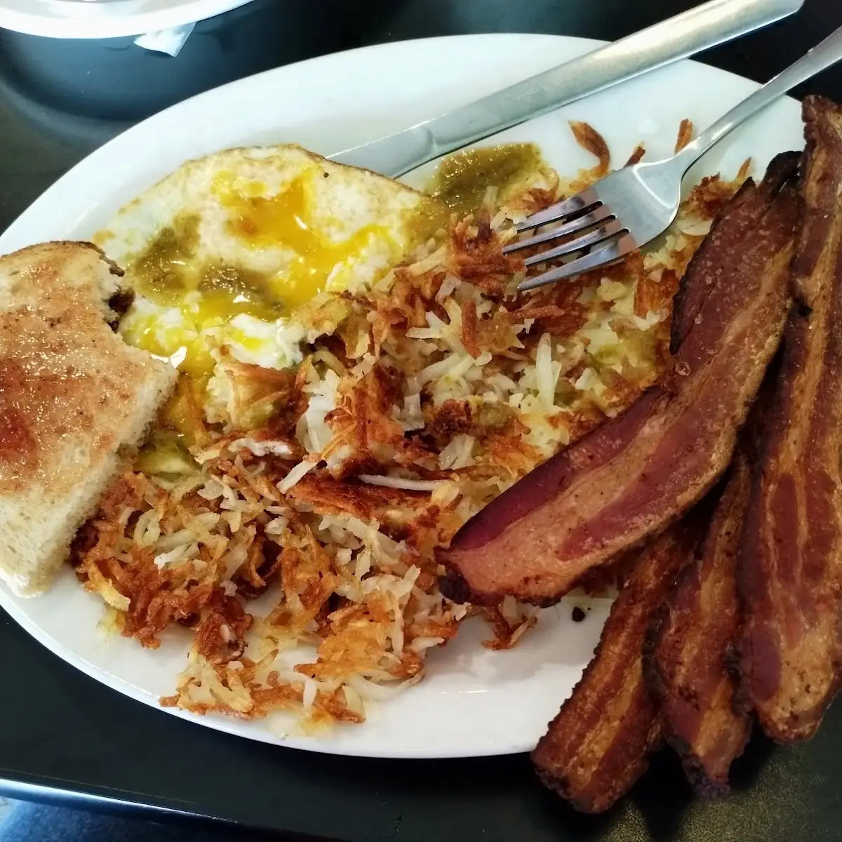 Thick Bacon Hash Browns Eggs and Sourdough Bread