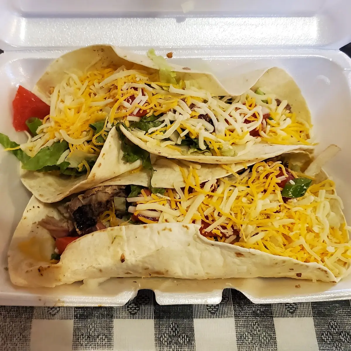 One Is a Brisket the Other Is a Pulled Pork Taco