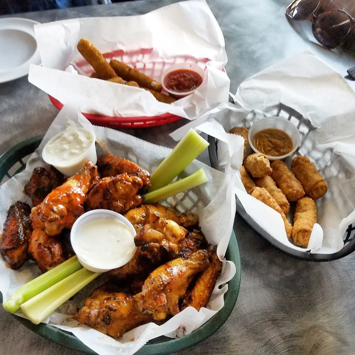 Wings Mozzarella Sticks and Egg Rolls