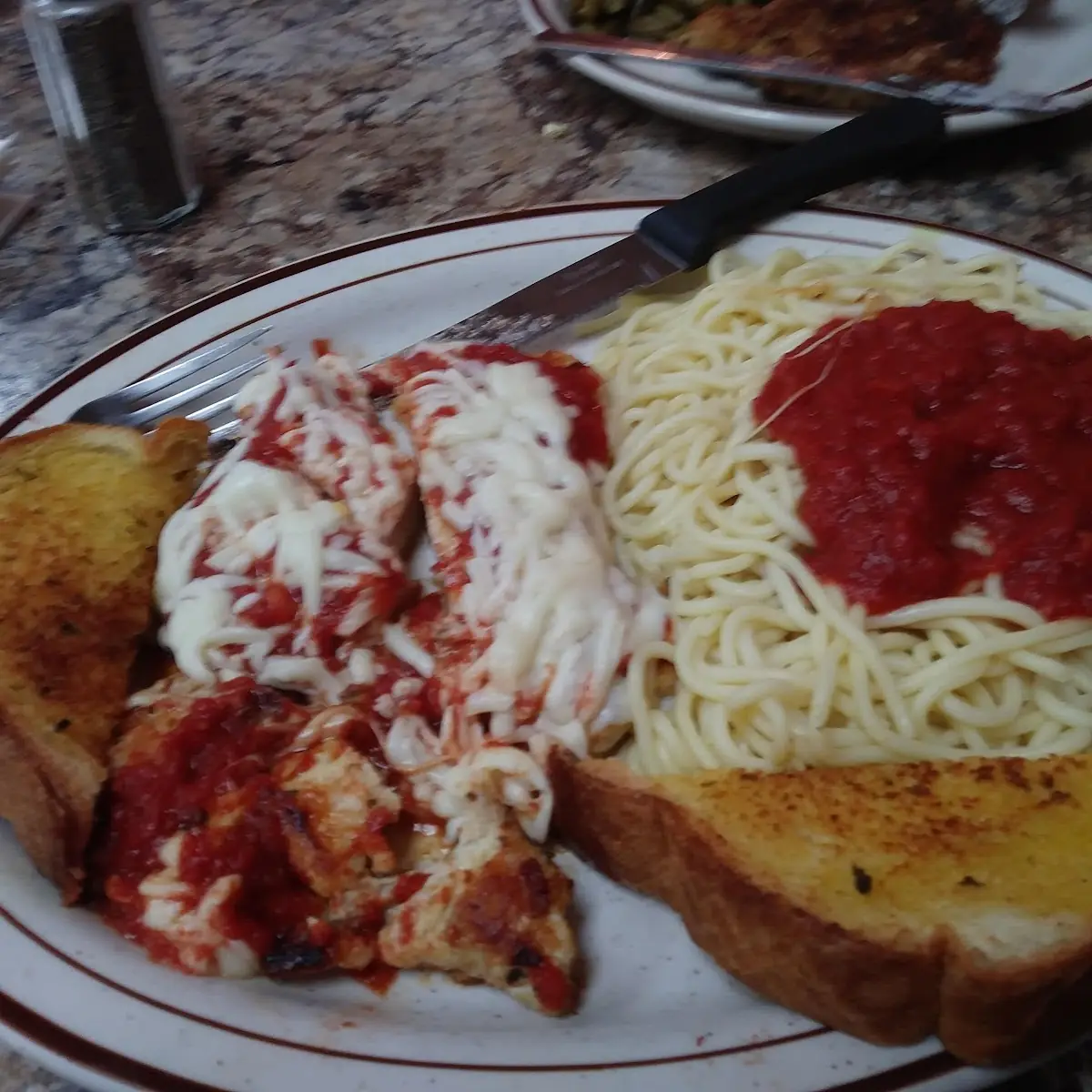 Breast of Chicken Parmesan