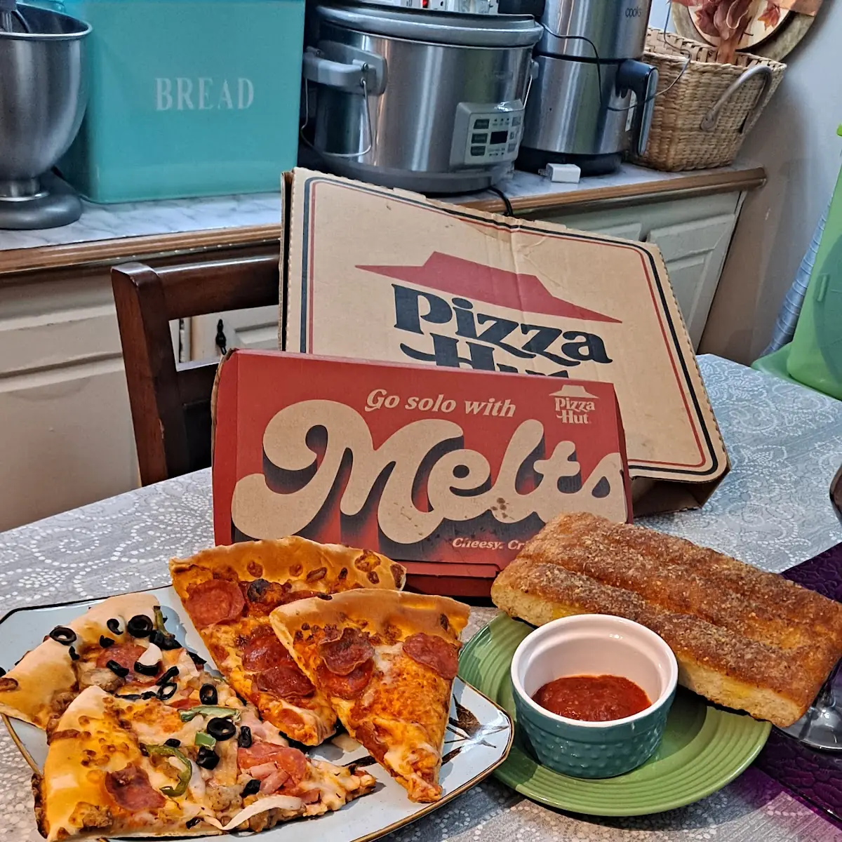 Pepperoni Pizza and Supreme Pizza with Breadsticks