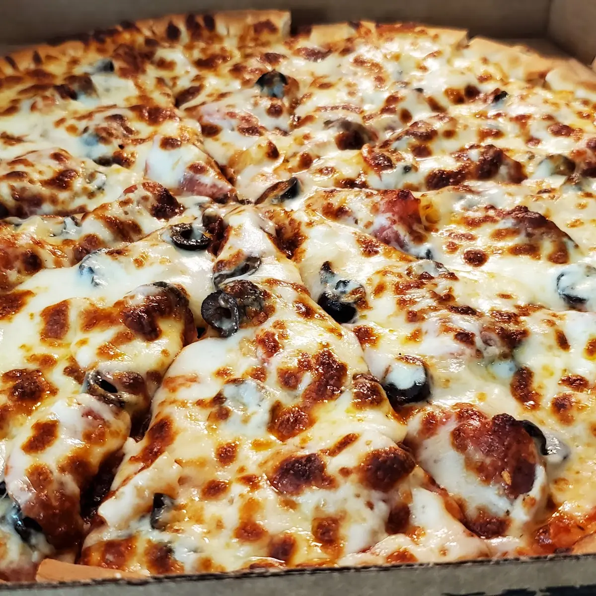 Large Pepperoni Black Olives and Pineapple Pizza
