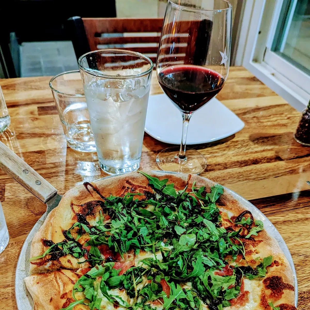 Chef's Favorite White Pizza with Prosciutto Arugula and a Balsamic Reduction