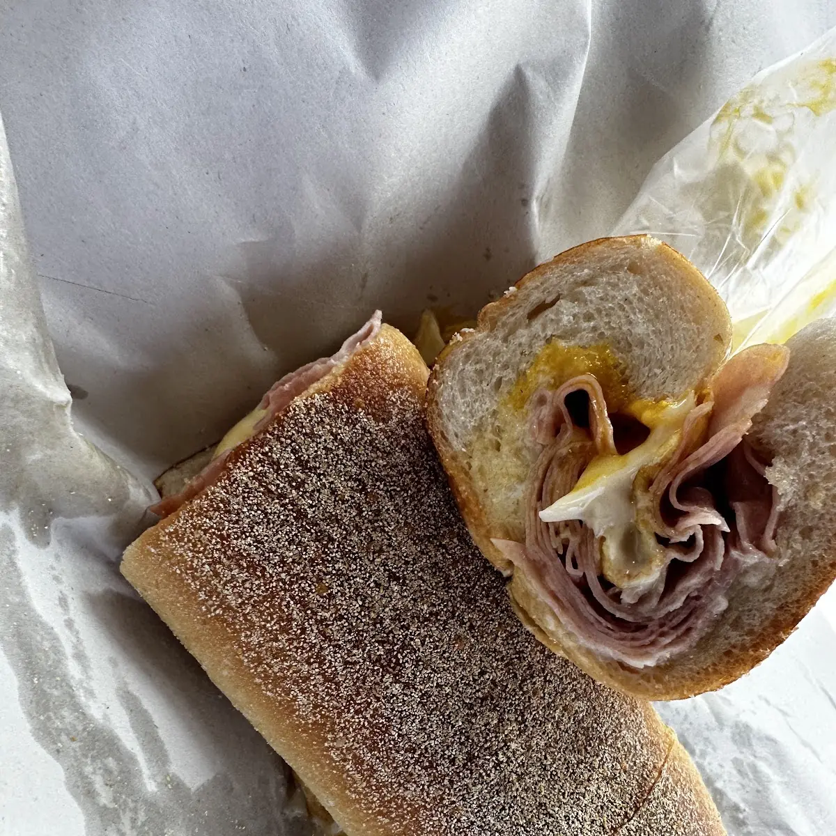 Ham Egg and Cheese Eggs over Easy on Long Roll