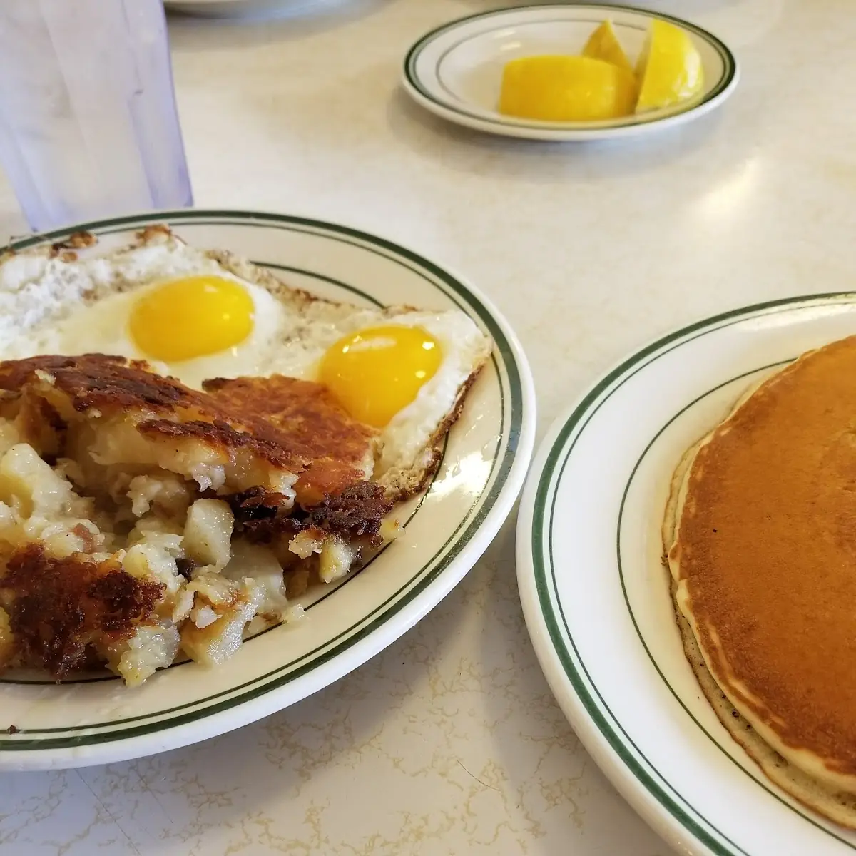 Two Eggs Two Pancakes with Potatoes and Ham