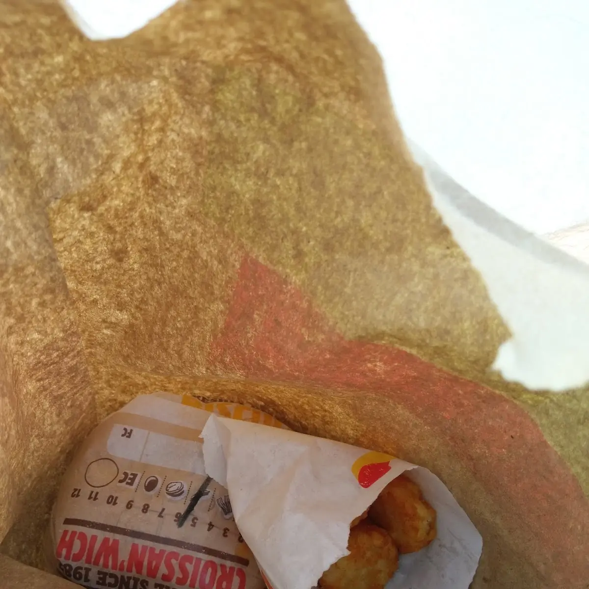 Sausage Egg and Cheese Croissant w Hashbrowns