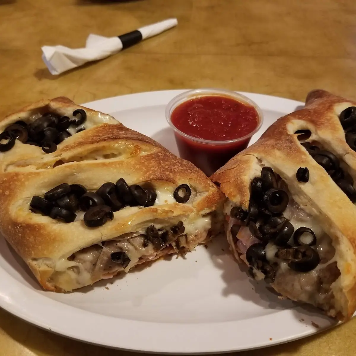 Meat Lovers Stromboli with Black Olives