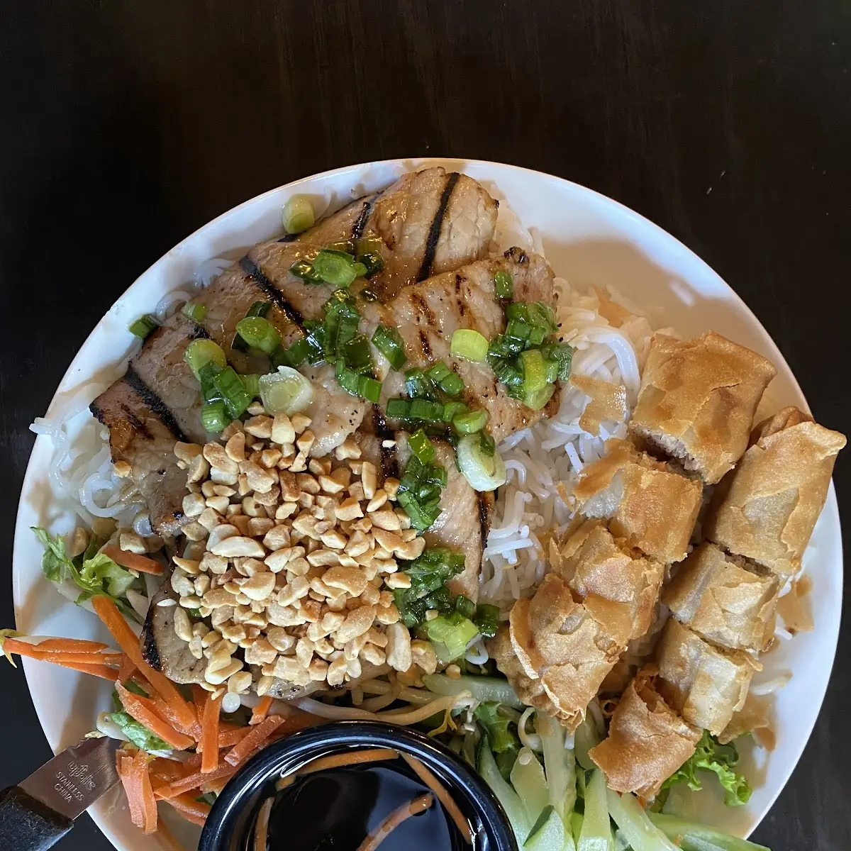 Grilled Pork and Crispy Spring Roll on Rice Noodles