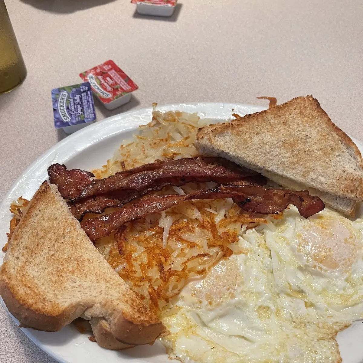 2 Eggs over Easy with Bacon and Hash Browns