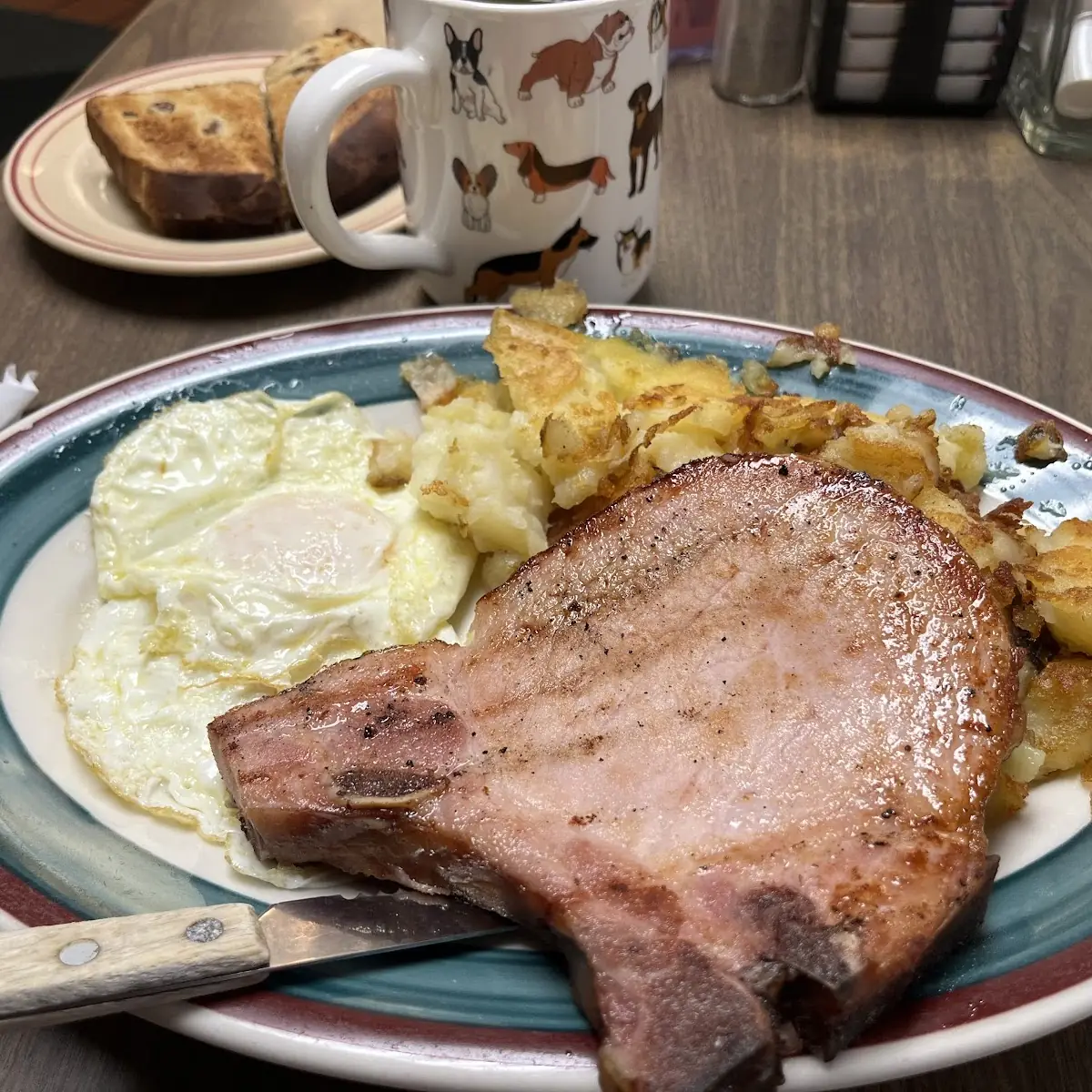 12 Oz Smoked Pork Chop and Eggs