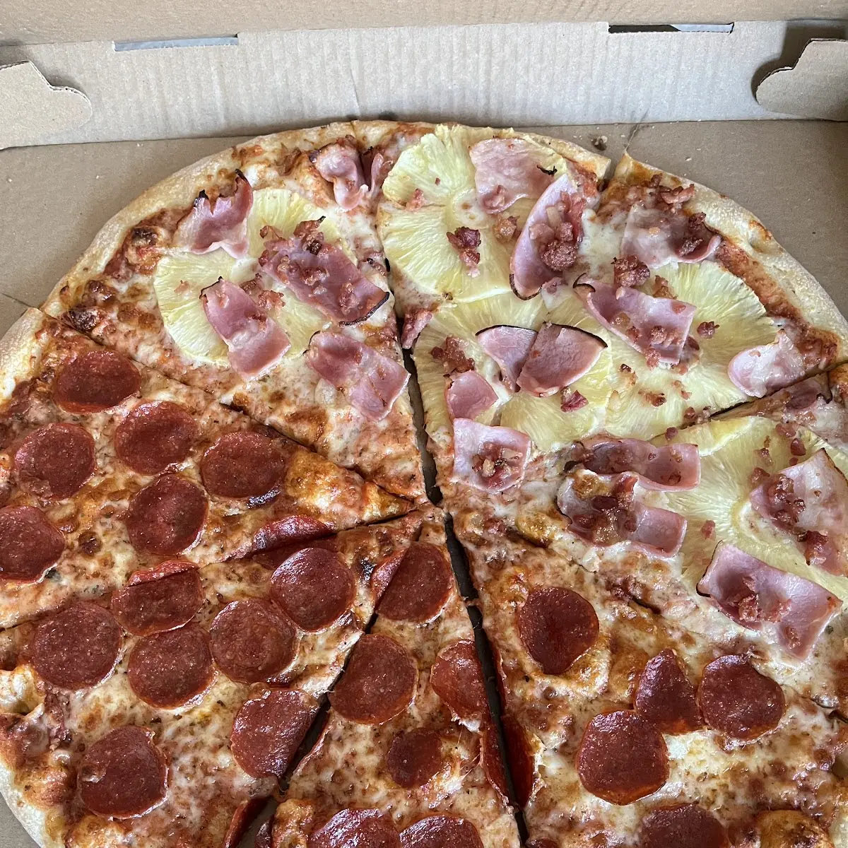 Half Hawaiian and Half Pepperoni Pizza