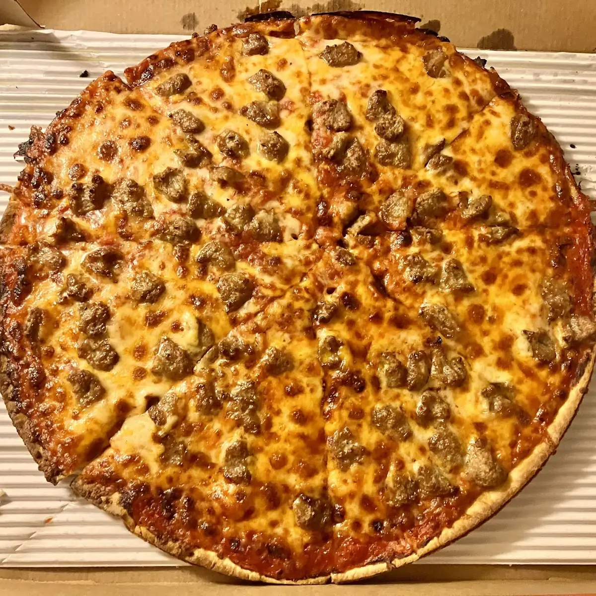 Thin Crust Cheese and Sausage Pizza