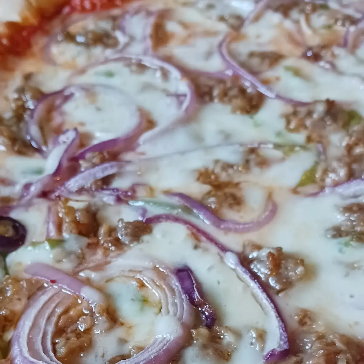 Sausage Peppers Onion and Extra Cheese