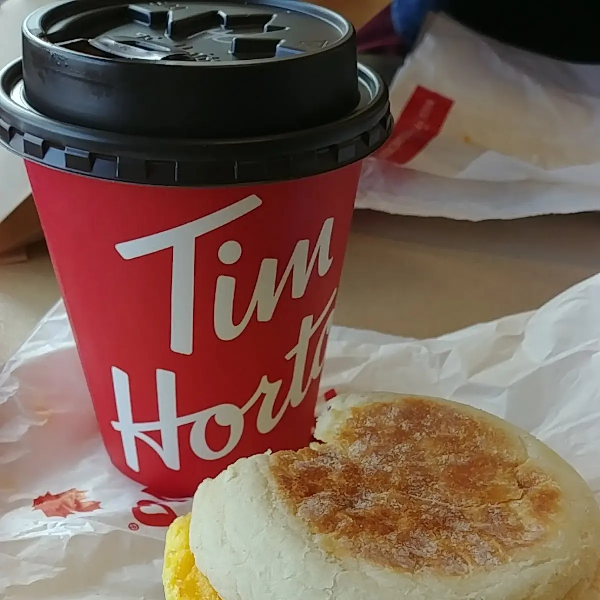 Hot Chocolate with a Sausage English Muffin Breakfast Sandwich