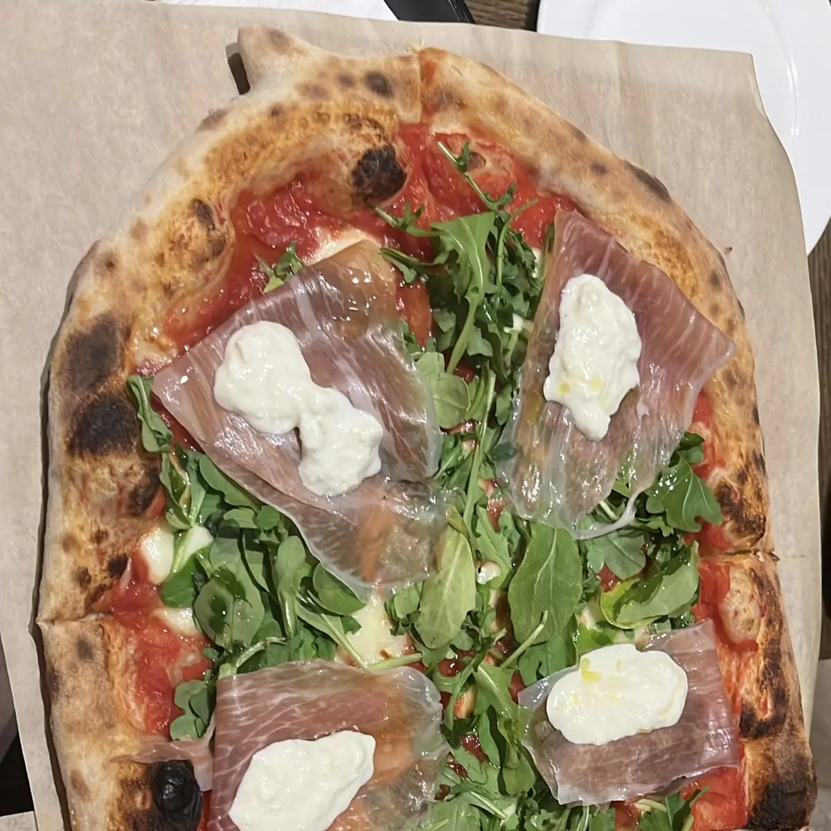 Prosciutto Arugula and Burrata Pizza