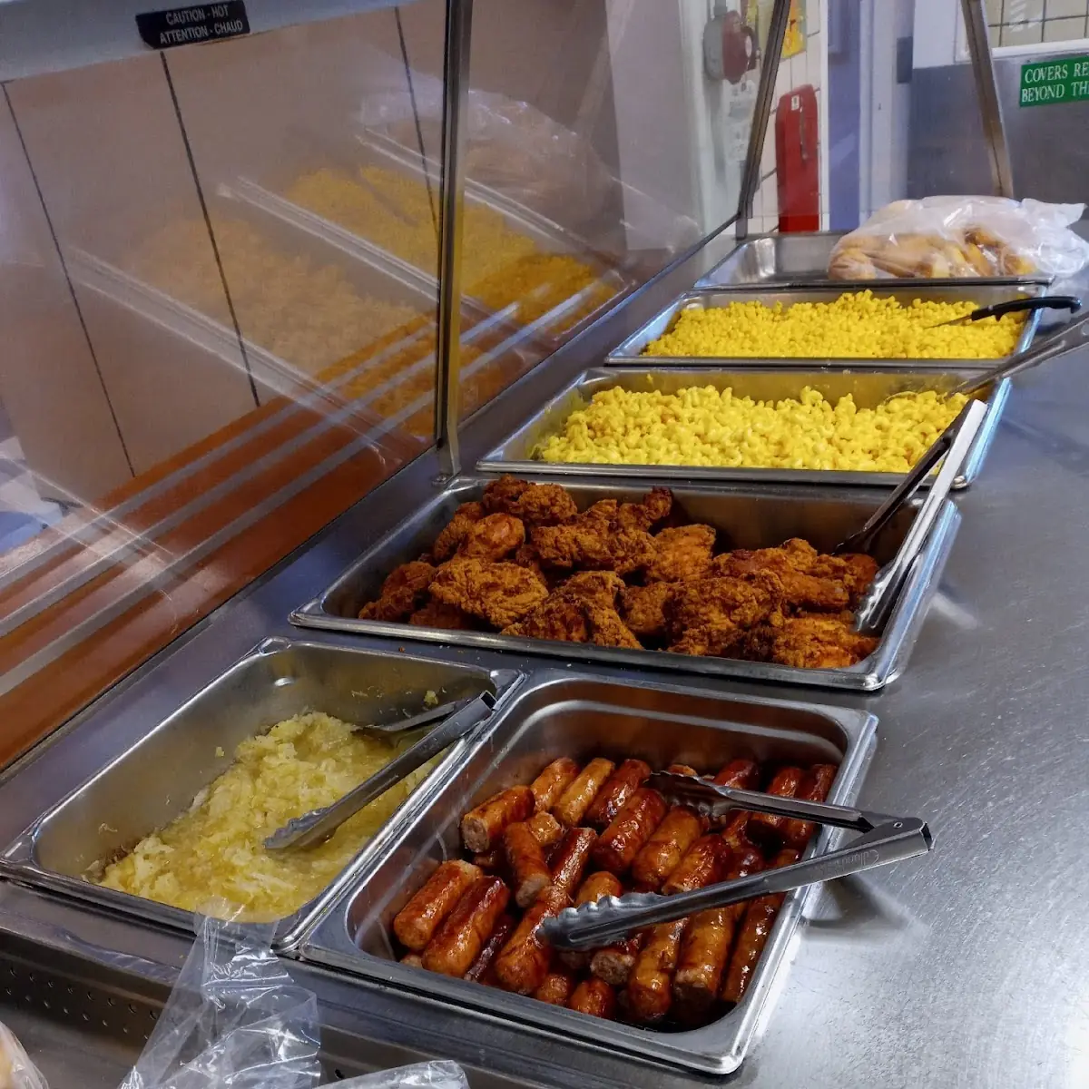 Fried Chicken Bratwurst Mac and Cheese Corn and a Dinner Roll