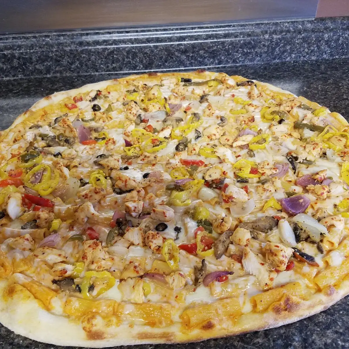 Chicken Riggie Pizza Slices