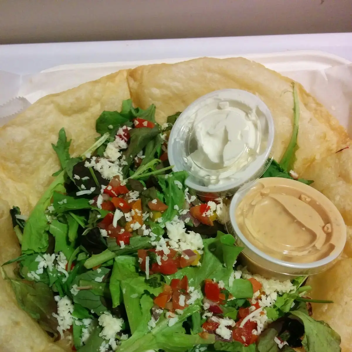 The Taco Salad Is Lettuce Tomato & Cheese