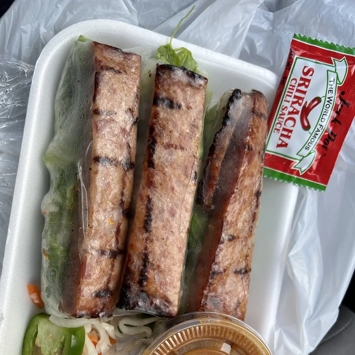 Pork Sausage Spring Rolls with Peanut Sauce