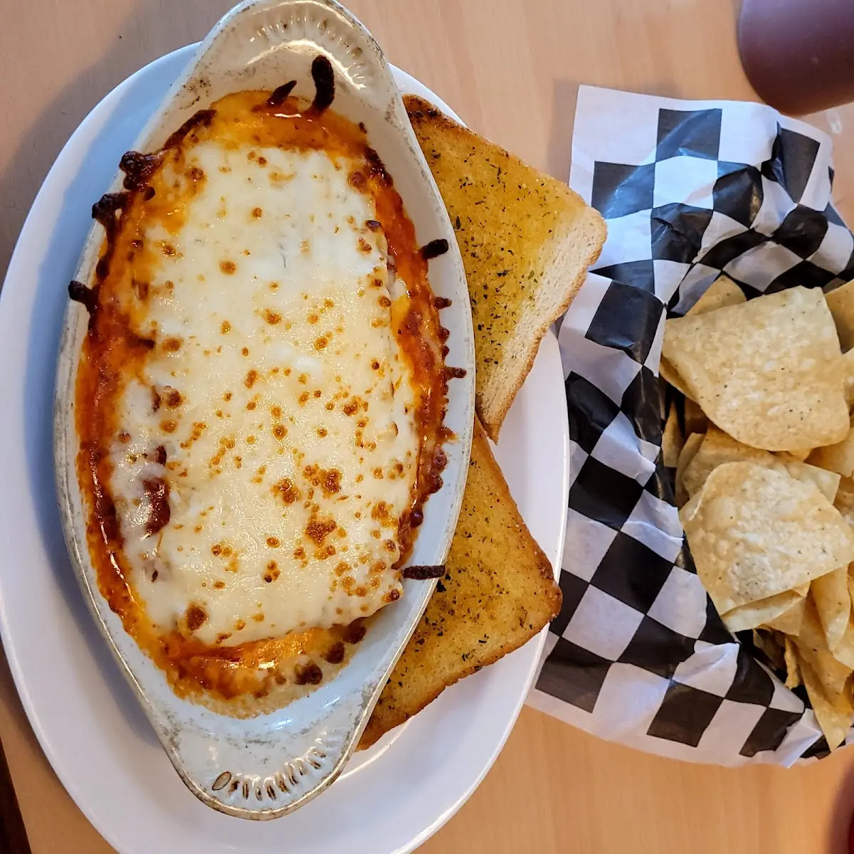Lasagna Served with Garlic Bread