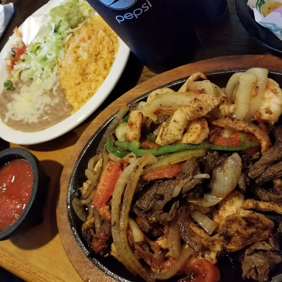Steak Chicken and Shrimp Fajitas