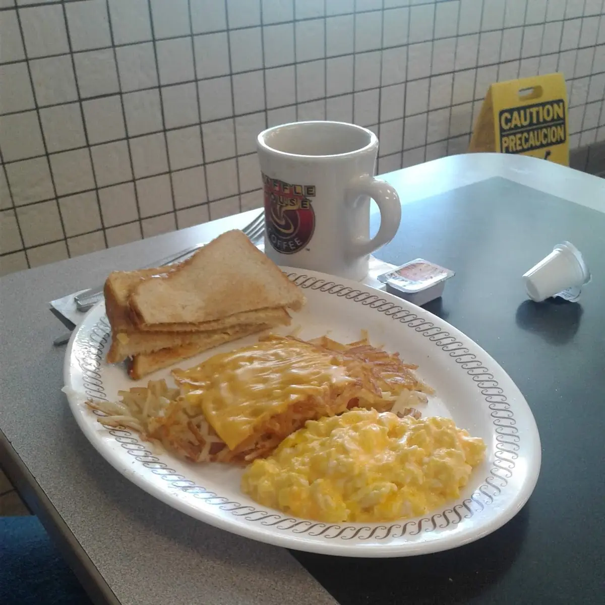 2 Eggs Scrambled with Cheese Hash Browns with Ham Mushrooms Jalapenos and Cheese