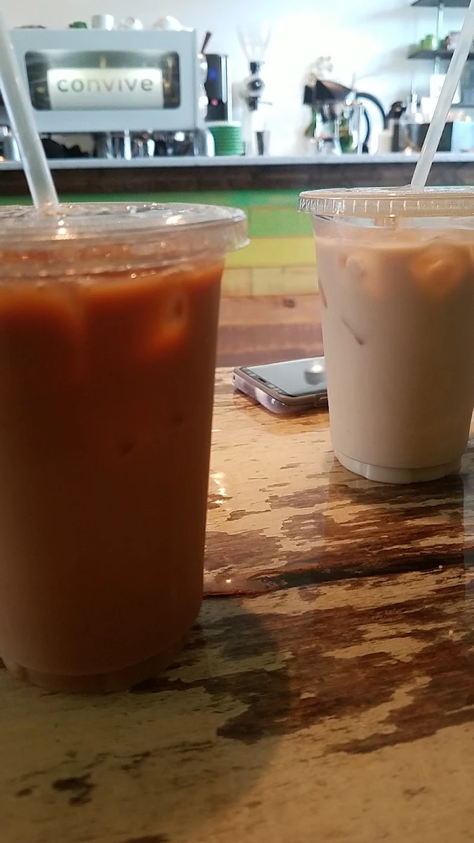 Left Iced Coffee Right Iced Chai Latte