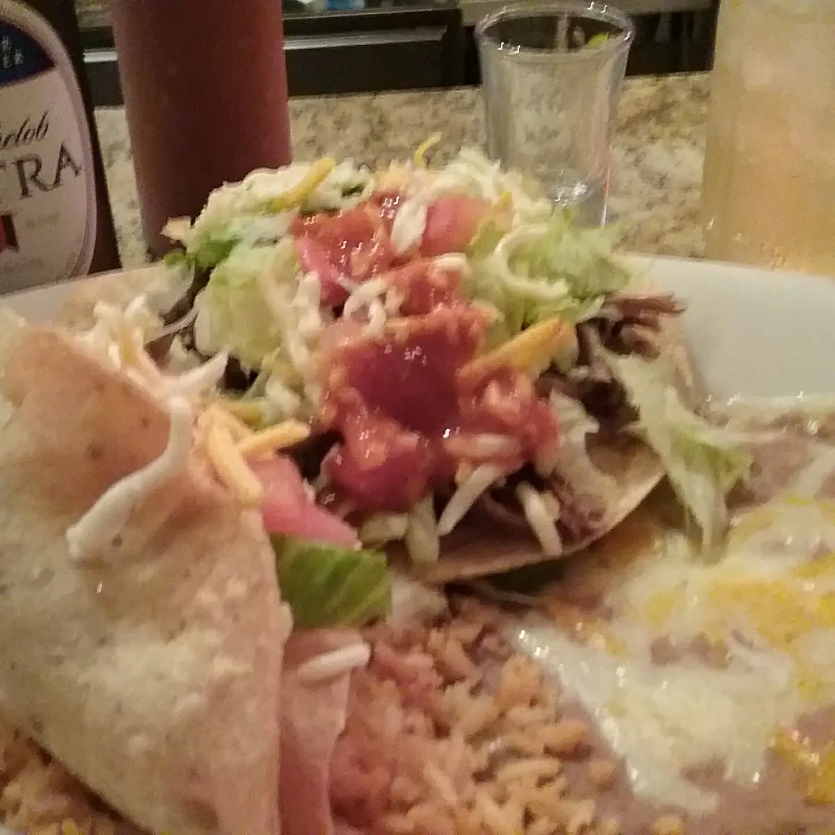 Shredded Beef Taco Tostada and Refried Beans