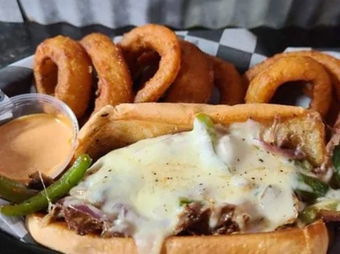 Philly Cheese Steak Sandwich and Onion Rings