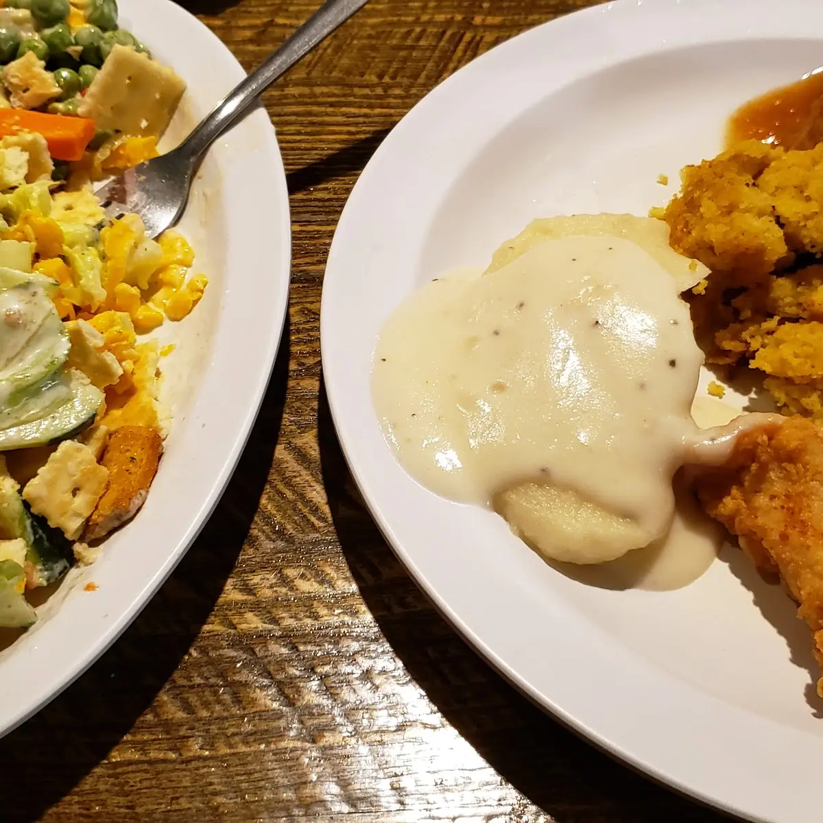 Buffet of Chicken Strips Ham Stuffing Mashed Potatoes and Gravy Plus Salad Bar