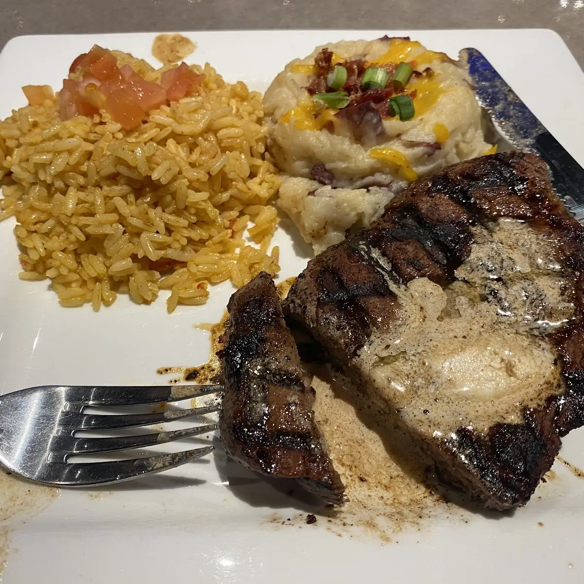 Steak and Rice and Mashed Potatoes and Gravy