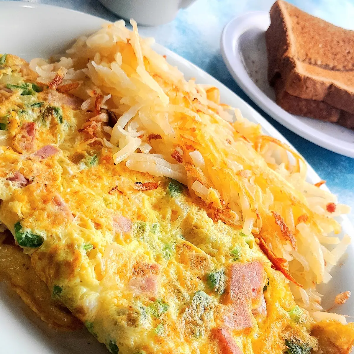 Western Omelette w Cheese and Hash Browns