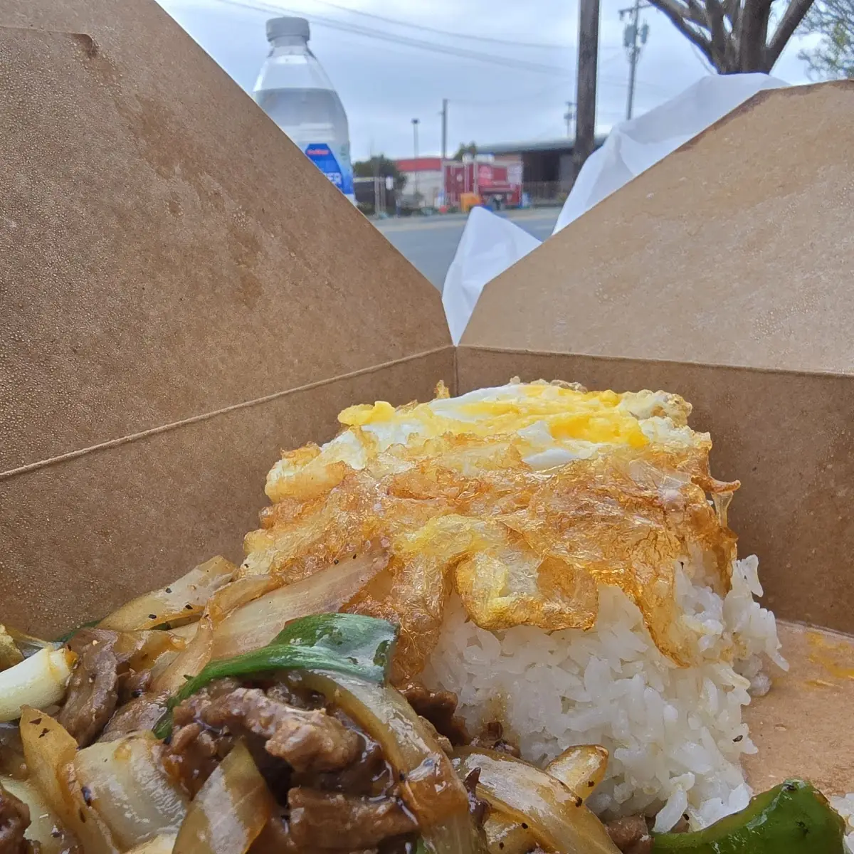 Stir Fried Beef in Black Pepper Sauce with Fried Egg