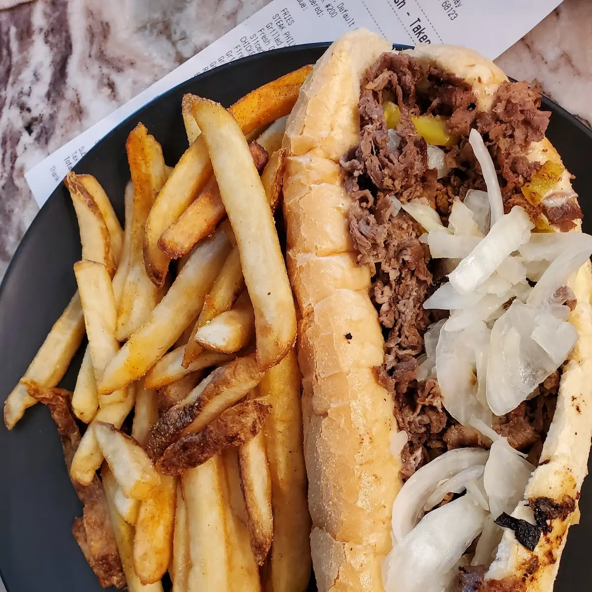 Philly Cheese Steak Sandwich with Fries