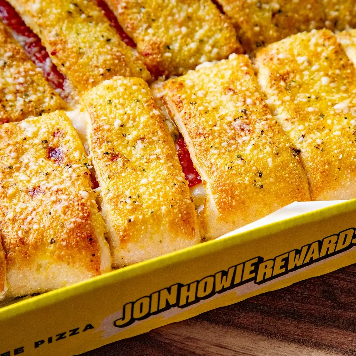 Our Pepperoni Stuffed Howie Bread Is Filled with Pepperoni Mozzarella & Cheddar Cheese