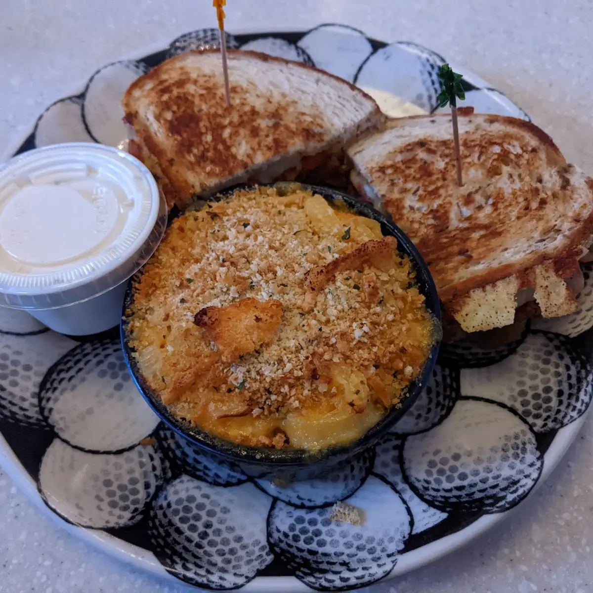Grilled Sticky Bread Pudding with White Chocolate Rum Sauce