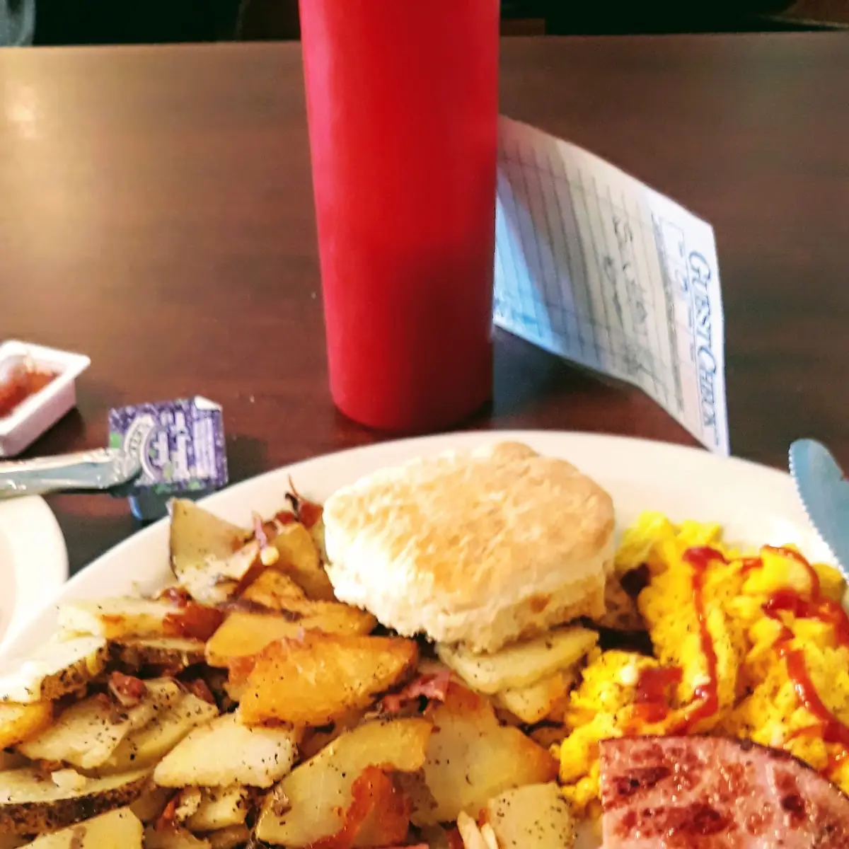Scrambled Eggs with Ham and Home Fries with Biscuits