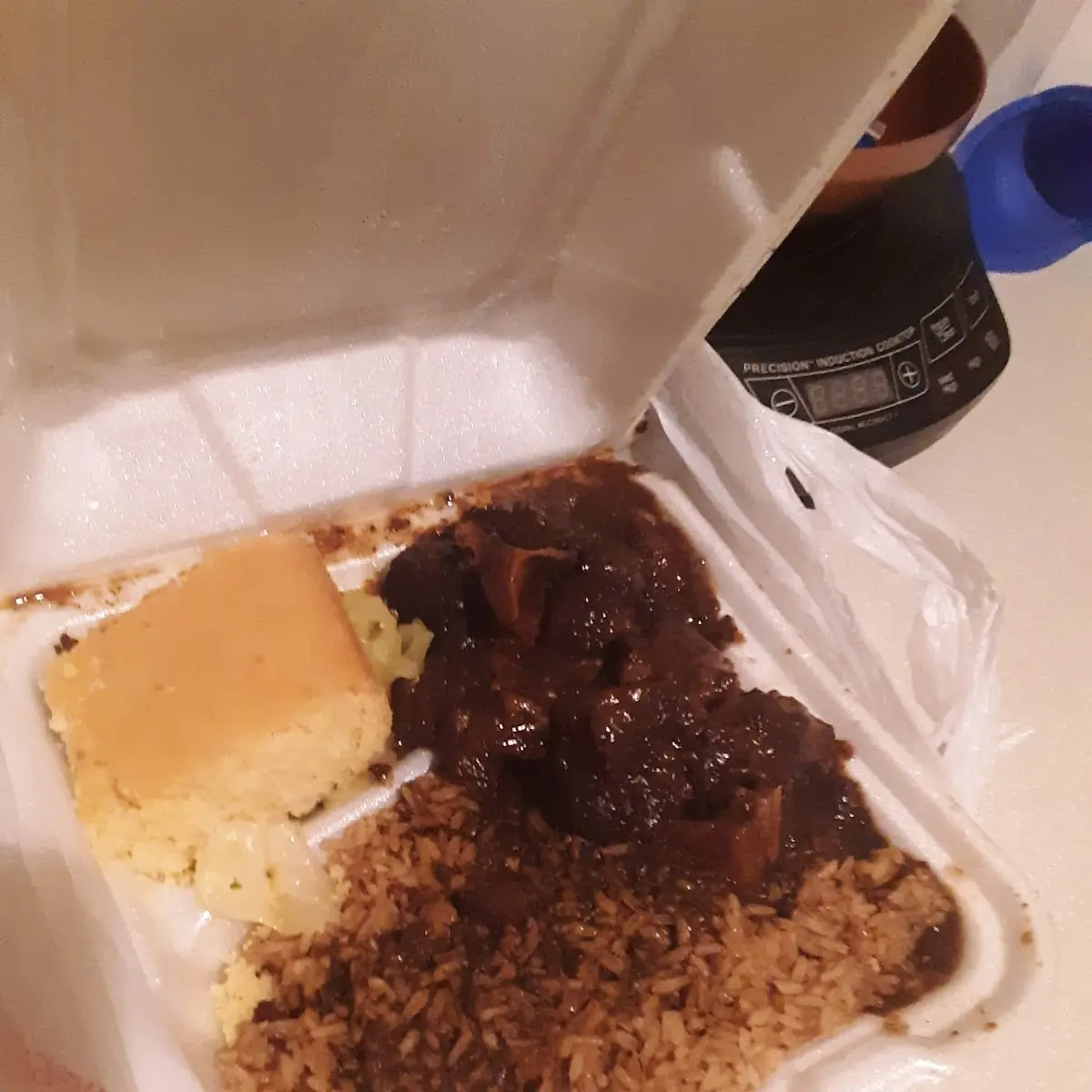 Oxtail w Rice & Beans Cabbage and Corn Bread