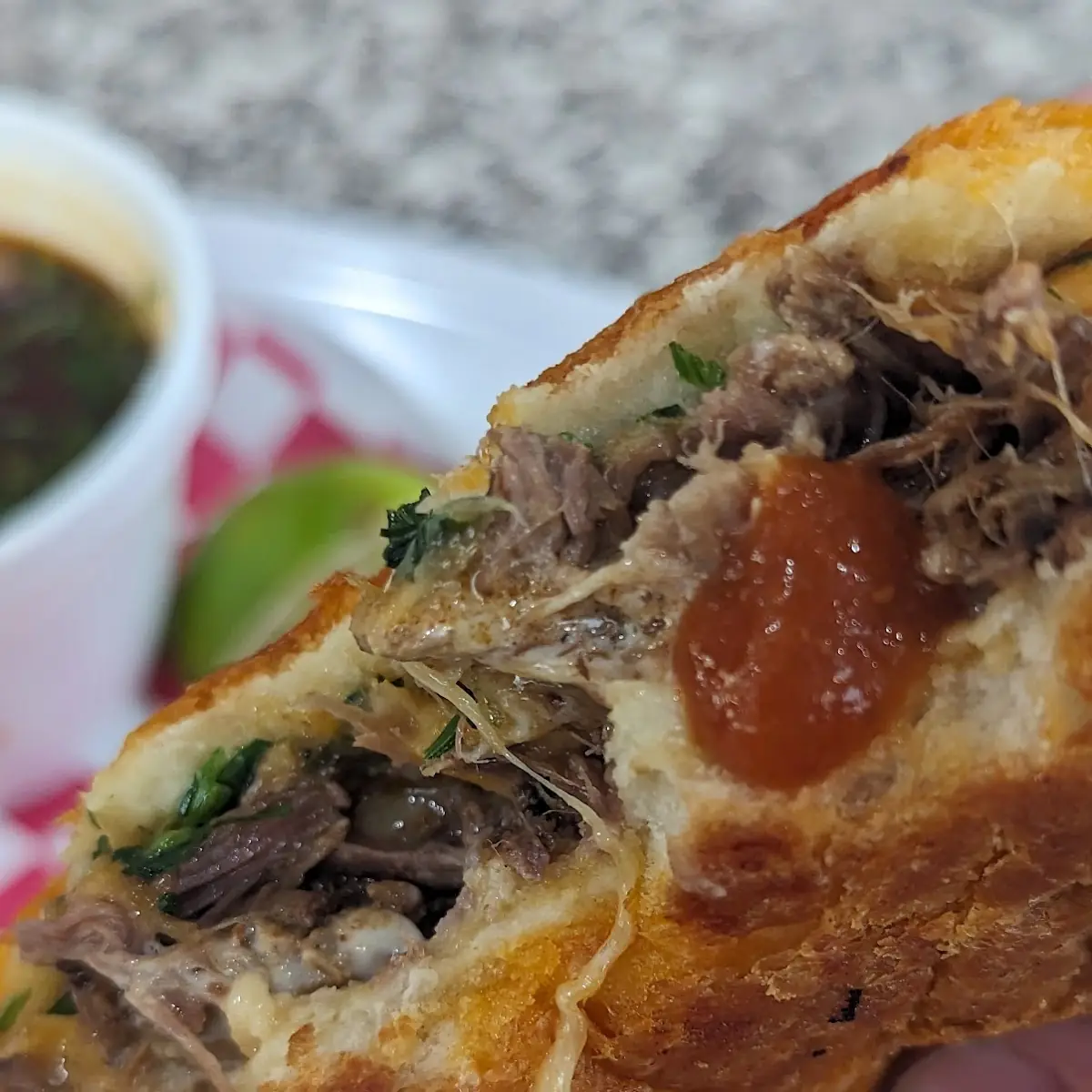 Birria Slow Cooked Beef Torta